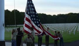 scouts raising the flag